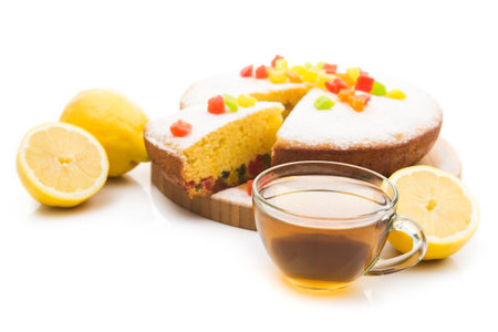 Hot cup of tea, Tasty pie with lemons isolated on white background.の写真素材