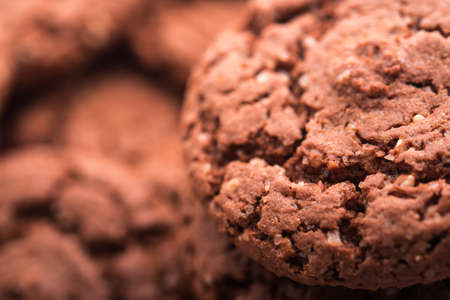 Closeup of chocolate cookies on backgroundの写真素材
