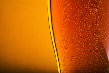Closeup of beer glass on backgroundの写真素材