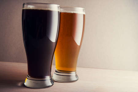 Glasses of beer on pub tableの写真素材