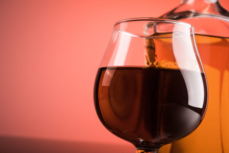 Glass of brandy on background.の写真素材
