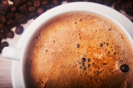 Hot cup of coffee. Misted photo.