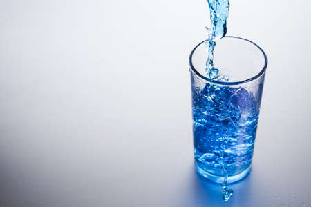 Glass of water on white backgroundの写真素材