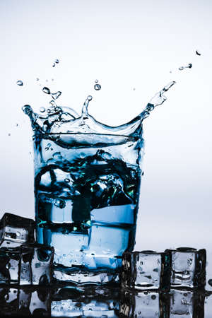 Beautiful splash of water in glassの写真素材