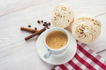 White coffee cup on wooden tableの写真素材