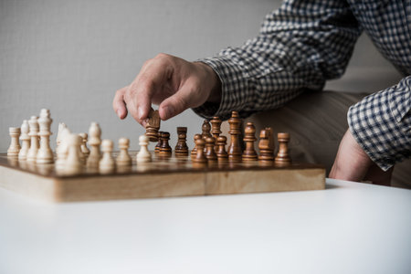 Man play chess game in office space