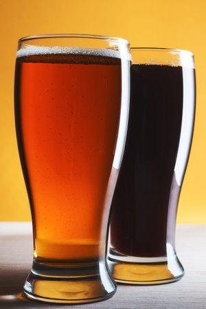 Beer in glasses on wood tableの写真素材