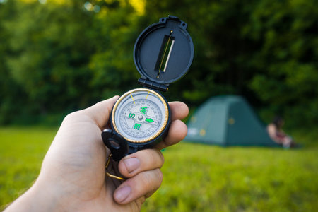 Traveler was lost and looking for a way out of the forest using a compass