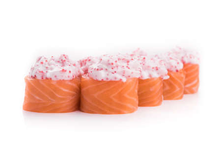 sushi with crab meat, mayonnaise and tobiko caviar isolated on white backgroundの写真素材