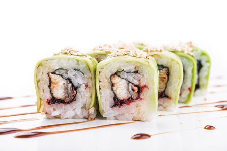rolls with tuna, cheese and avocado isolated on white backgroundの写真素材