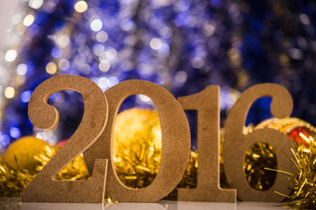 Christmas balls on abstract background with white figures 2016の写真素材