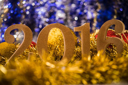 Christmas balls on abstract background with white figures 2016の写真素材