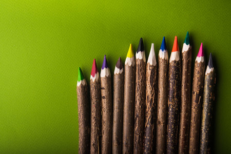 color pencils on green backgroundの写真素材