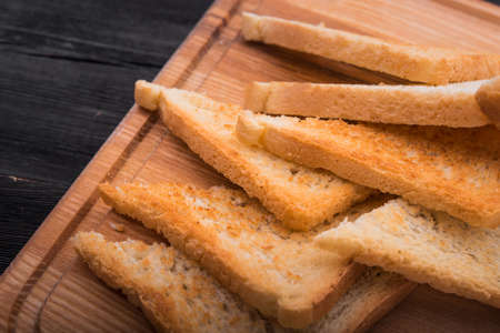 close up of wheat bread toasted on backgroundの写真素材