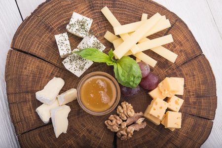 cheese set on wooden boardの写真素材