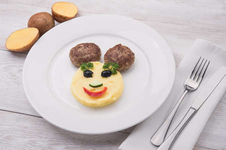 mashed potatoes with meat cutlets. children's menu at the restaurantの写真素材