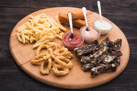 set snack for beer on wood boardの写真素材