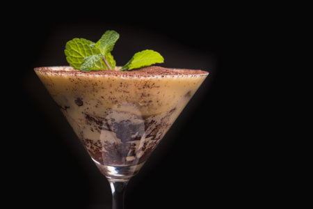 chocolate tiramisu with green mint in glassの写真素材