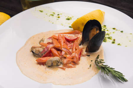 seafood mussel with lemon in restaurant tableの写真素材