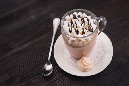 hot coffee with marshmallow on dark backgroundの写真素材