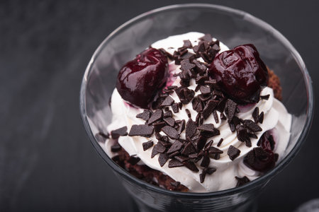 chocolate dessert in glass on dark background