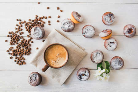 tasty cup of coffee and cakes on white boardの写真素材