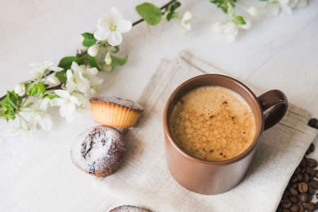 tasty cup of coffee and cakes on white boardの写真素材