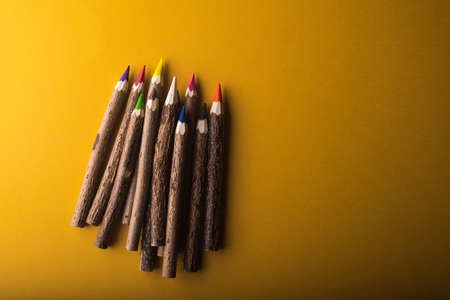 wood colored pencils on bright backgroundの写真素材