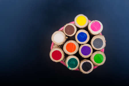 color wood pencils on black backgroundの写真素材