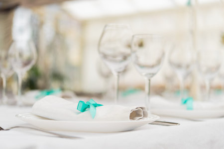 banqueting hall. serving table. decorated wedding chairs in row. wedding luxury party place....