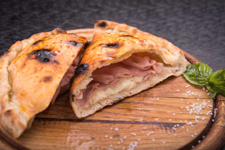 hot pita bread with meat on wooden boardの写真素材