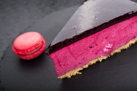 tasty piece of cake on stone slate. restaurant dessert on the pitchの写真素材