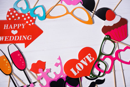 photo booth props for wedding. funny paper faces, lips, glasses and mustacheの写真素材