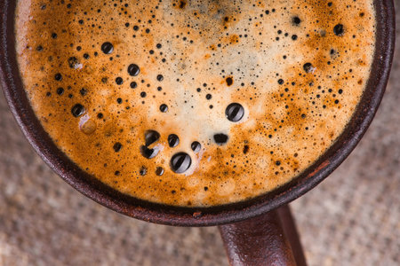 close up of tasty coffee cup on wood tableの写真素材
