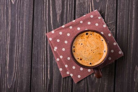 close up of tasty coffee cup on wood tableの写真素材