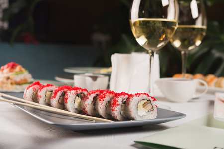 Dinner at the restaurant. Japanese food. Salmon sushi on the table in the restaurant.の写真素材
