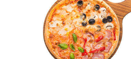 mix pizza on wood board isolated on white backgroundの写真素材