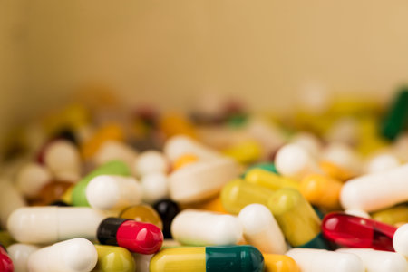 colored pills in white box. pharmacy healthy concept
