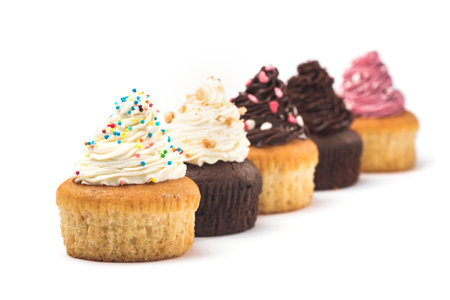 tasty dessert cakes isolated on white backgroundの写真素材