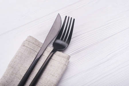 knife and fork on wooden table.cutlery on backgroundの写真素材