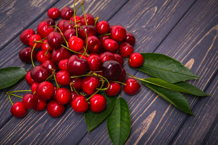 fresh sweet cherry on a wooden tableの写真素材