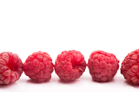fresh red raspberry isolated on white backgroundの写真素材