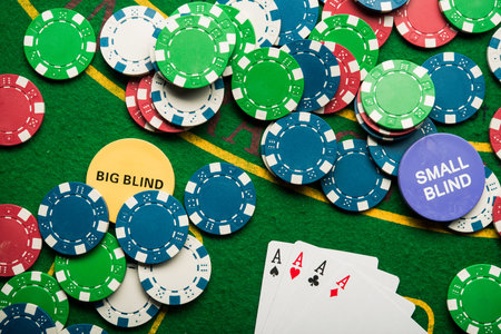 four ace in poker game. casino chips. chance to win the game