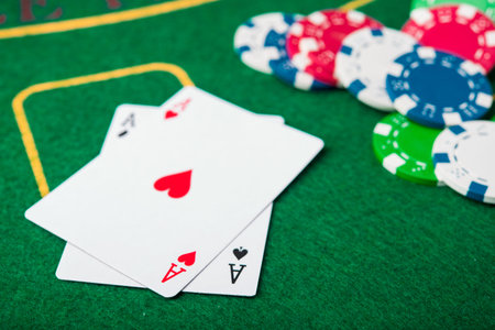 two ace in poker game. cards and chips on casino background