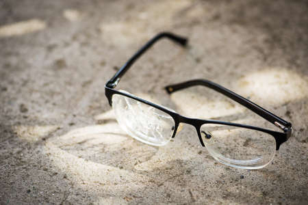 broken glasses on the asphalt. street accident conceptの写真素材