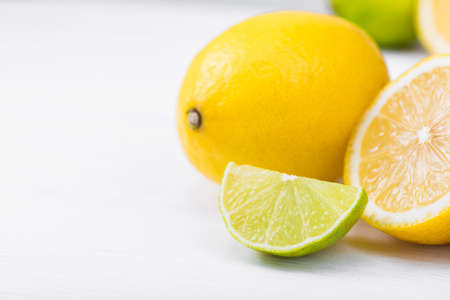 citrus fresh lemon fruit on white wood tableの写真素材
