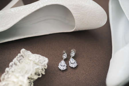 elegant white wedding shoes for women. day of marriageの写真素材