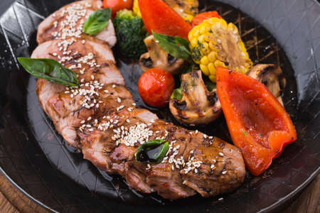 Grilled Vegetables and beef steak on frying pan .nutritious food right from the grill. hot restaurant dishの写真素材
