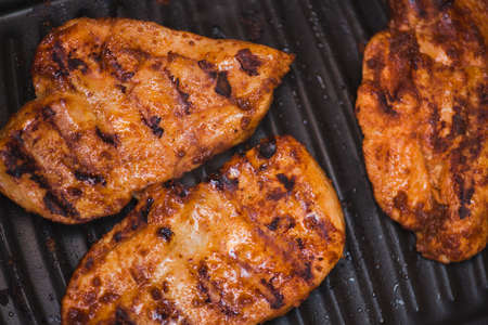 tasty bbq grilled chicken fillets prepare for dinnerの写真素材