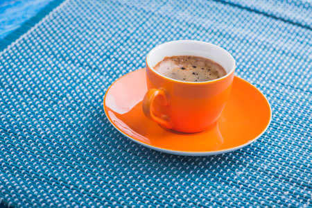 morning coffee cup on wood blue old table. tasty breakfastの写真素材